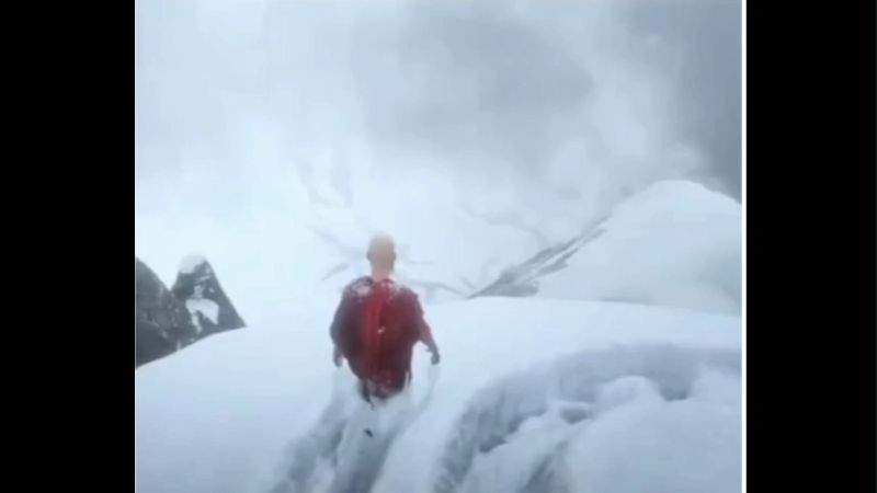 Man in red tshirt walking in snow trending game Instagram Memes Download
